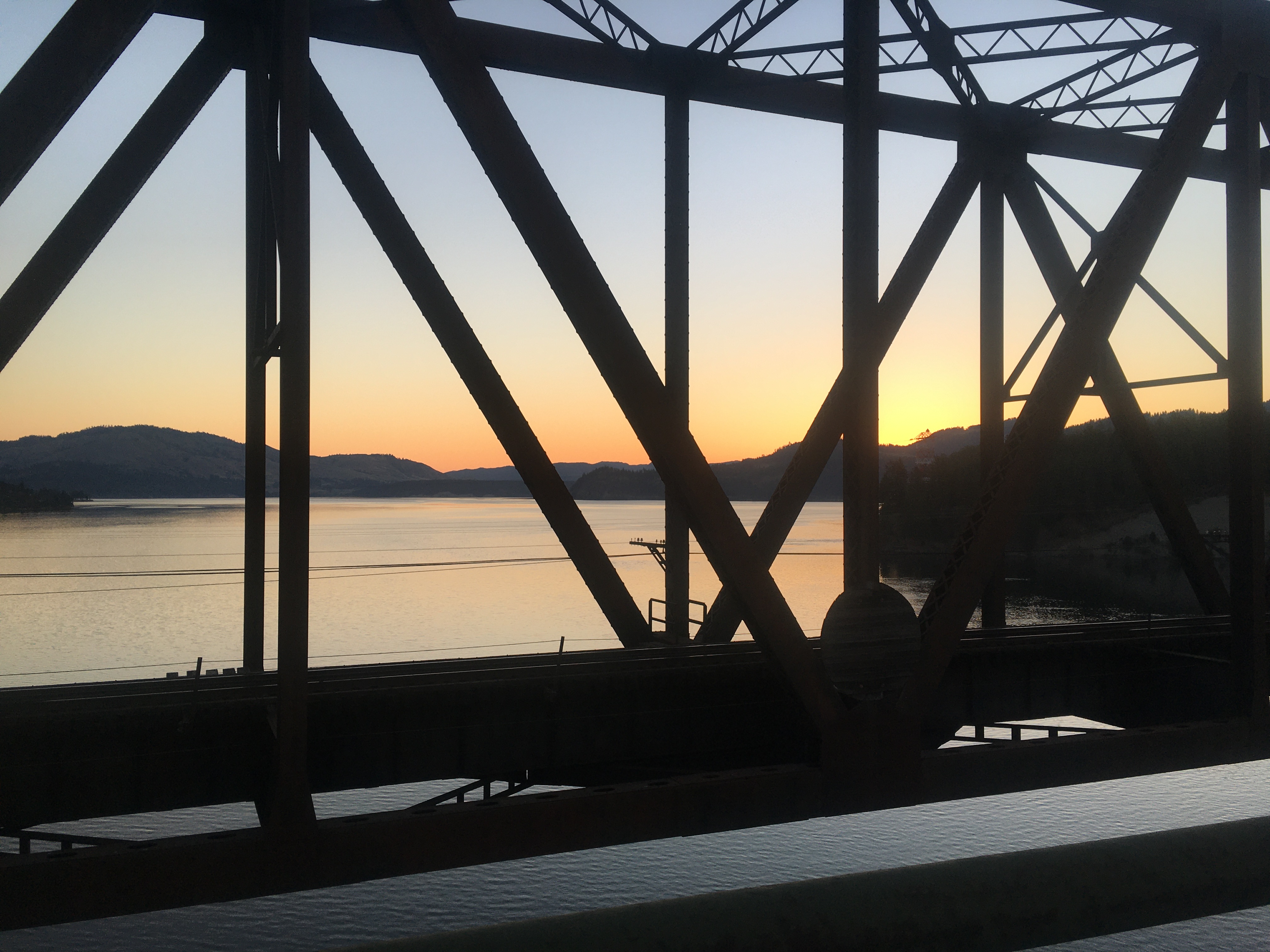 Yet another sunrise shot, this
one through the trusses of a bridge, with water and distance hills in the
background.