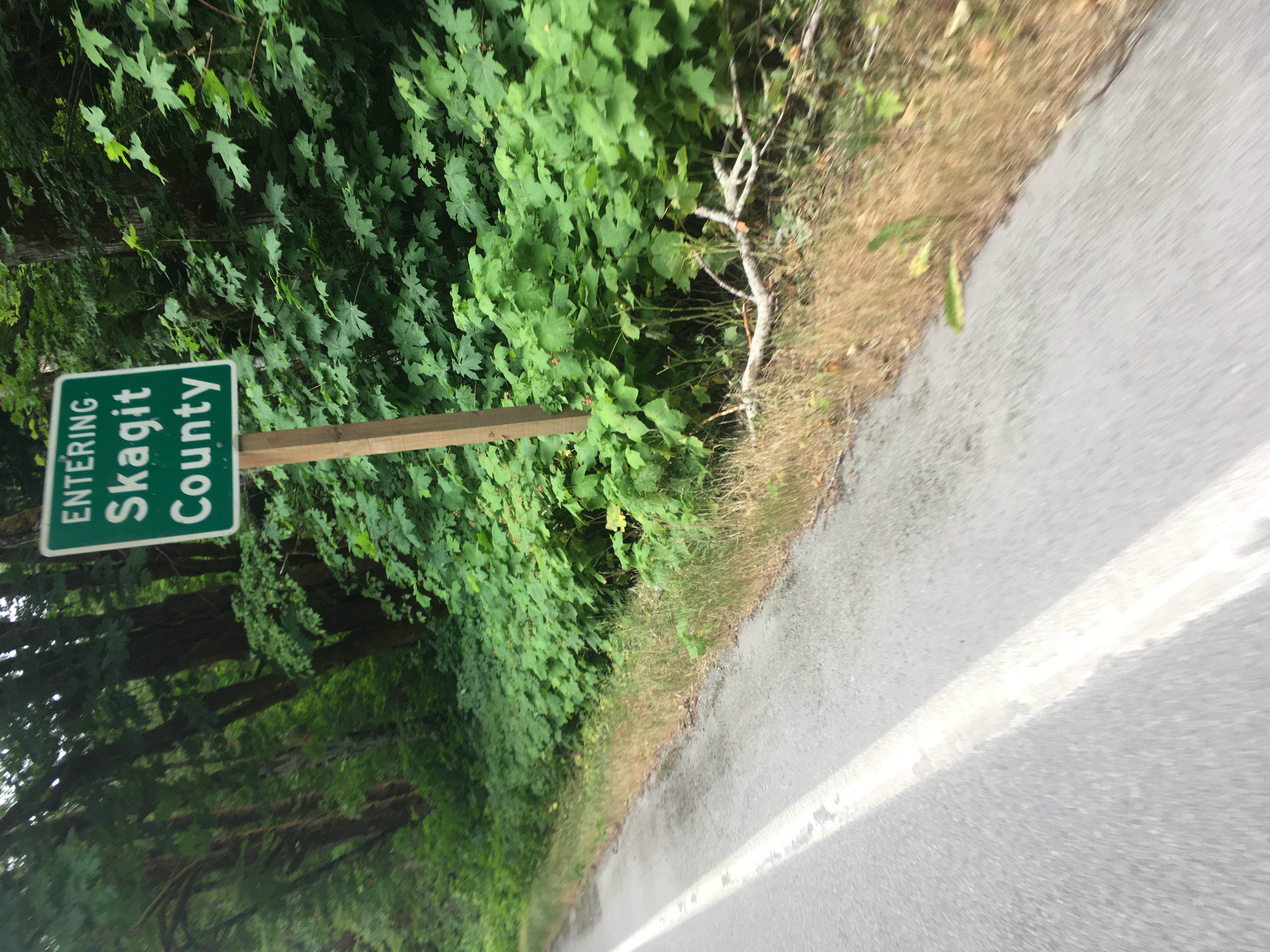 A road sign reads ENTERING
Skagit County